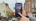 Mobile app prompting a user to tap the building, ground, or sky on the screen