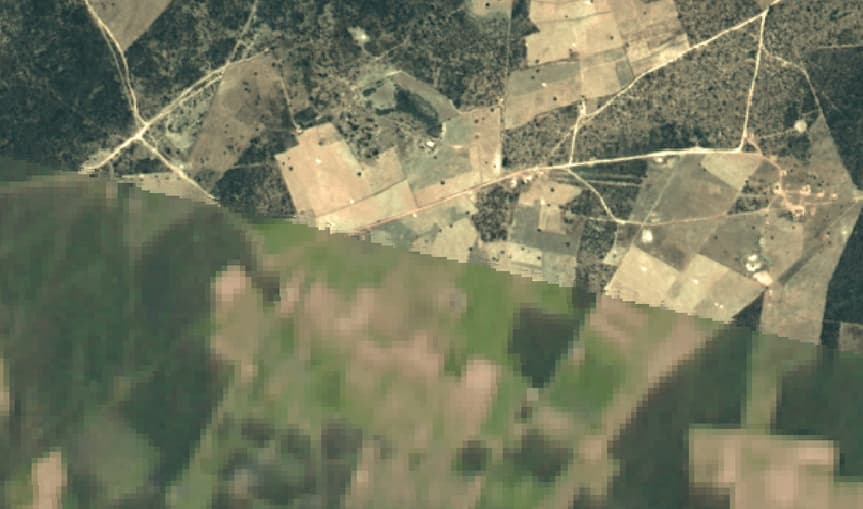 Sharp transition in image resolution and graininess across a scene boundary.