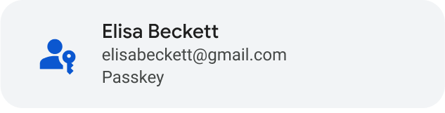 Un botón gris con un humano genérico azul y un ícono de llave a la izquierda, y “Elisa Beckett” a la derecha, seguido de su correo electrónico y la palabra “Llave de acceso”