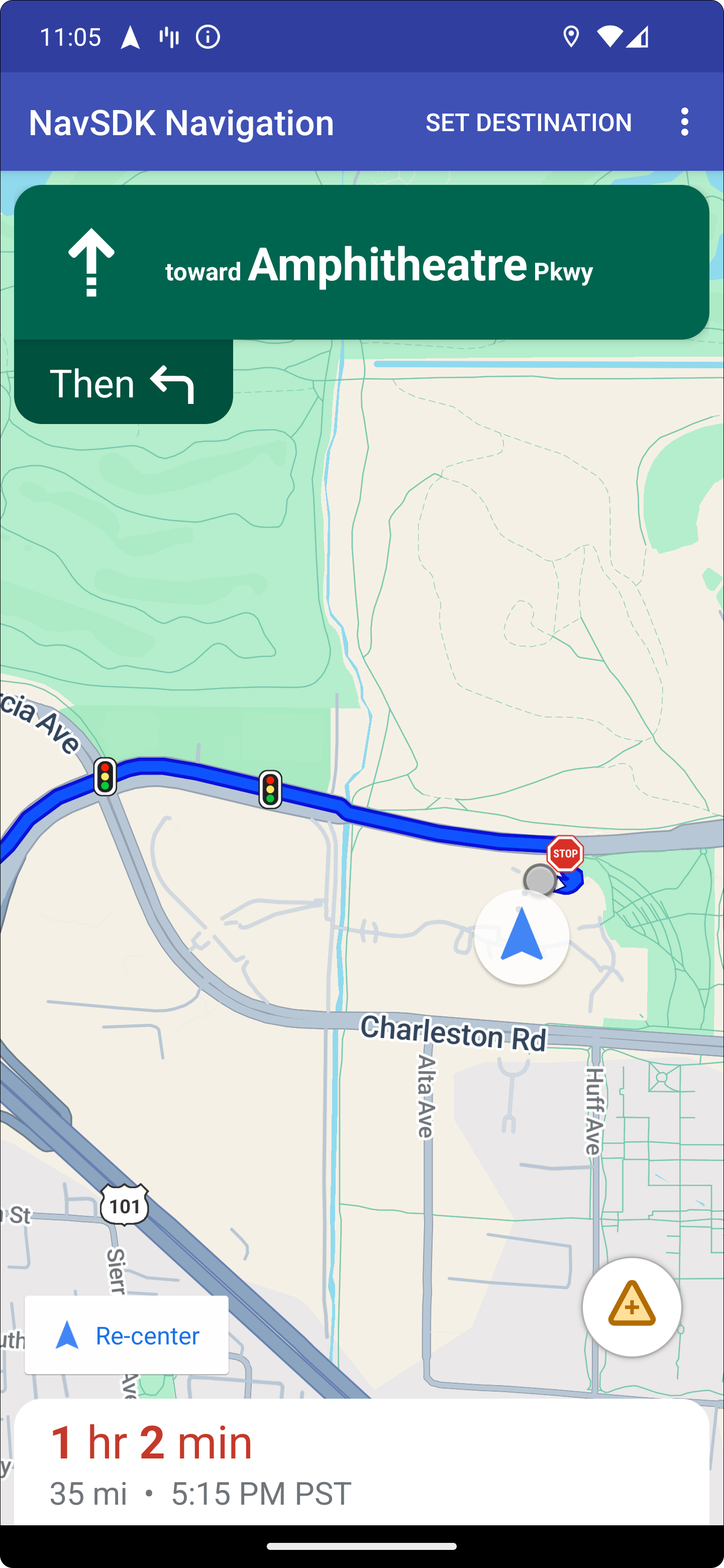 Traffic light and stop sign icons along a navigation route.
