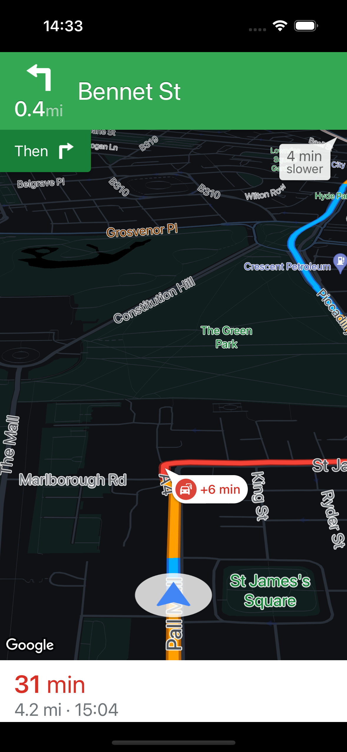 在 iPhone 15 Pro 上运行的 Navigation SDK 的屏幕截图，地图样式为深色。