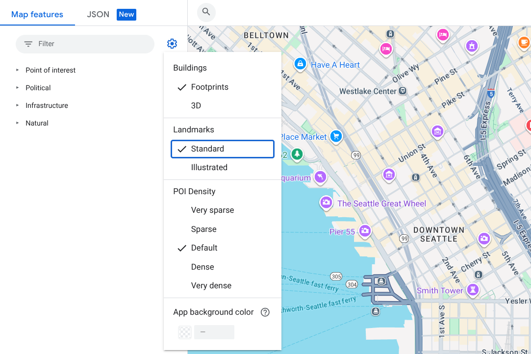 Mapa centrum Seattle z standardowymi ikonami miejsc w Google: mała biała ikona na ikonie w kształcie łzy w kolorze niebieskozielonym, umieszczona nad zabytkami, takimi jak Muzeum Sztuki i Smith Tower.