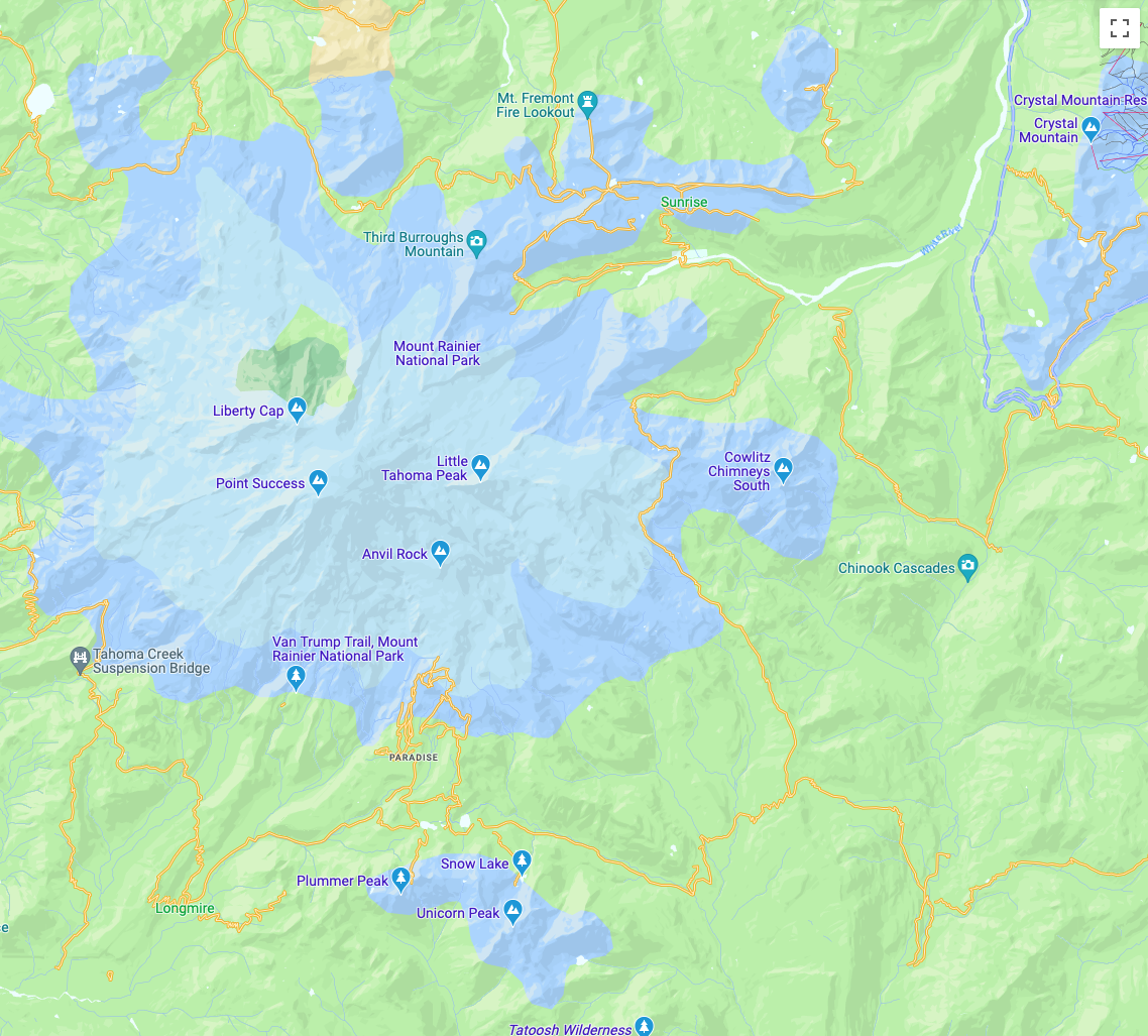 แผนที่ชัดเจนแสดงแผนที่ที่มีภูเขาเรนเนียร์สีฟ้า ล้อมรอบด้วยสีเขียวของสวนสาธารณะ