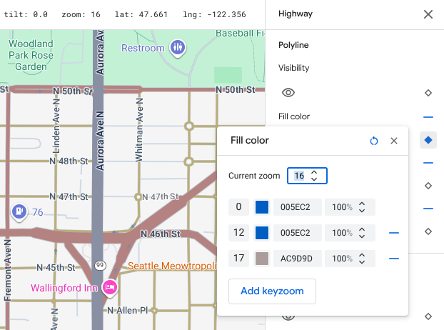Dieselbe Karte von Seattle, aber mit Zoomstilen, die bei Zoomstufe 12 und 17 hinzugefügt wurden, sodass die Farben der blauen Autobahn in die beigefarbene Oberfläche übergehen.