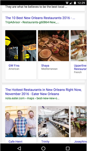Resultado de la búsqueda que muestra los mejores restaurantes de Nueva Orleans en una IU de carrusel nueva que puedes explorar desplazándote hacia la izquierda o la derecha